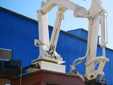 Εφαρμογή του χειριστή χύτευσης μπροστά από τον κλίβανο